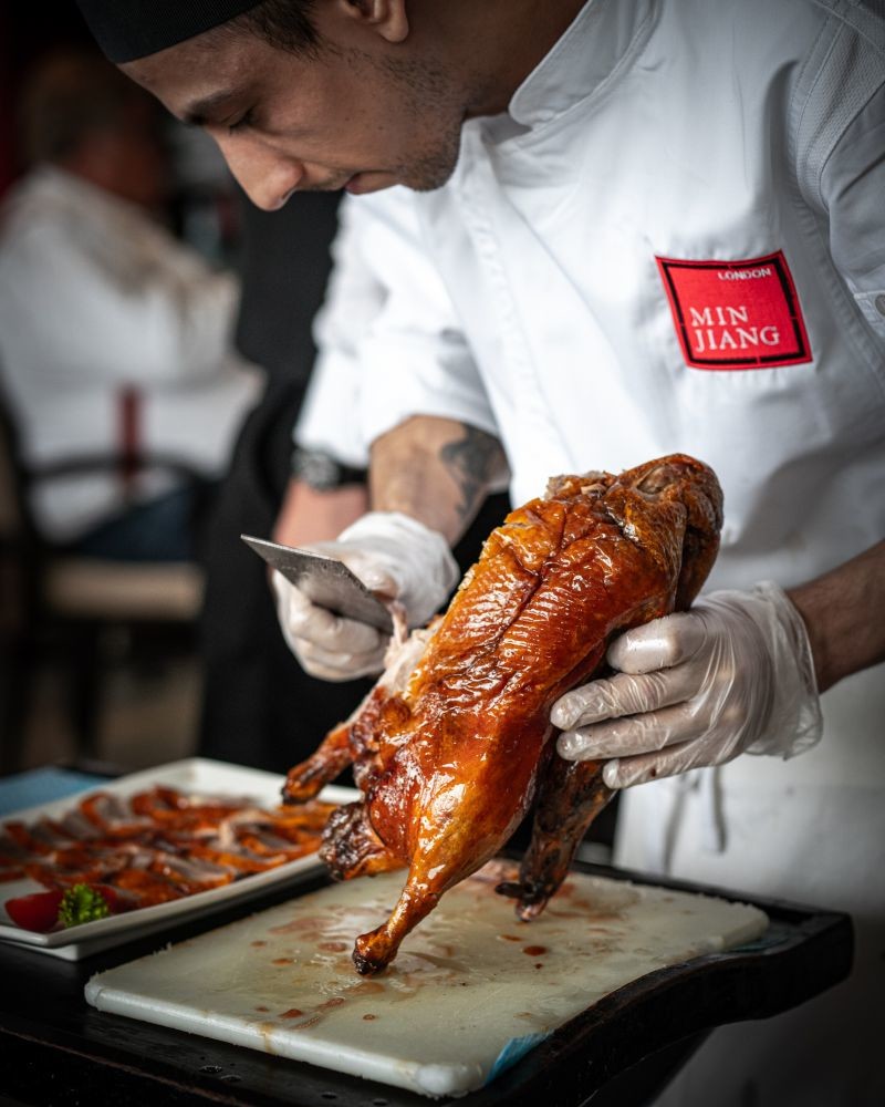 Min Jiang Legendary Wood-fired Beijing Duck Slicing on Tableside
